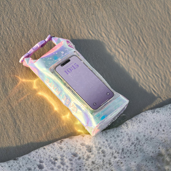 Iridescent phone case with a phone inside on sand
#color_iridescent
