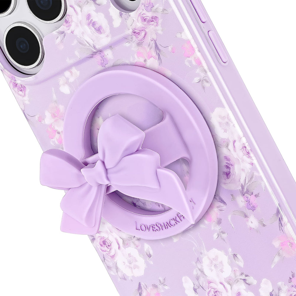 Floral phone case with a purple ring holder and bow design on a white 
background
#color_purple