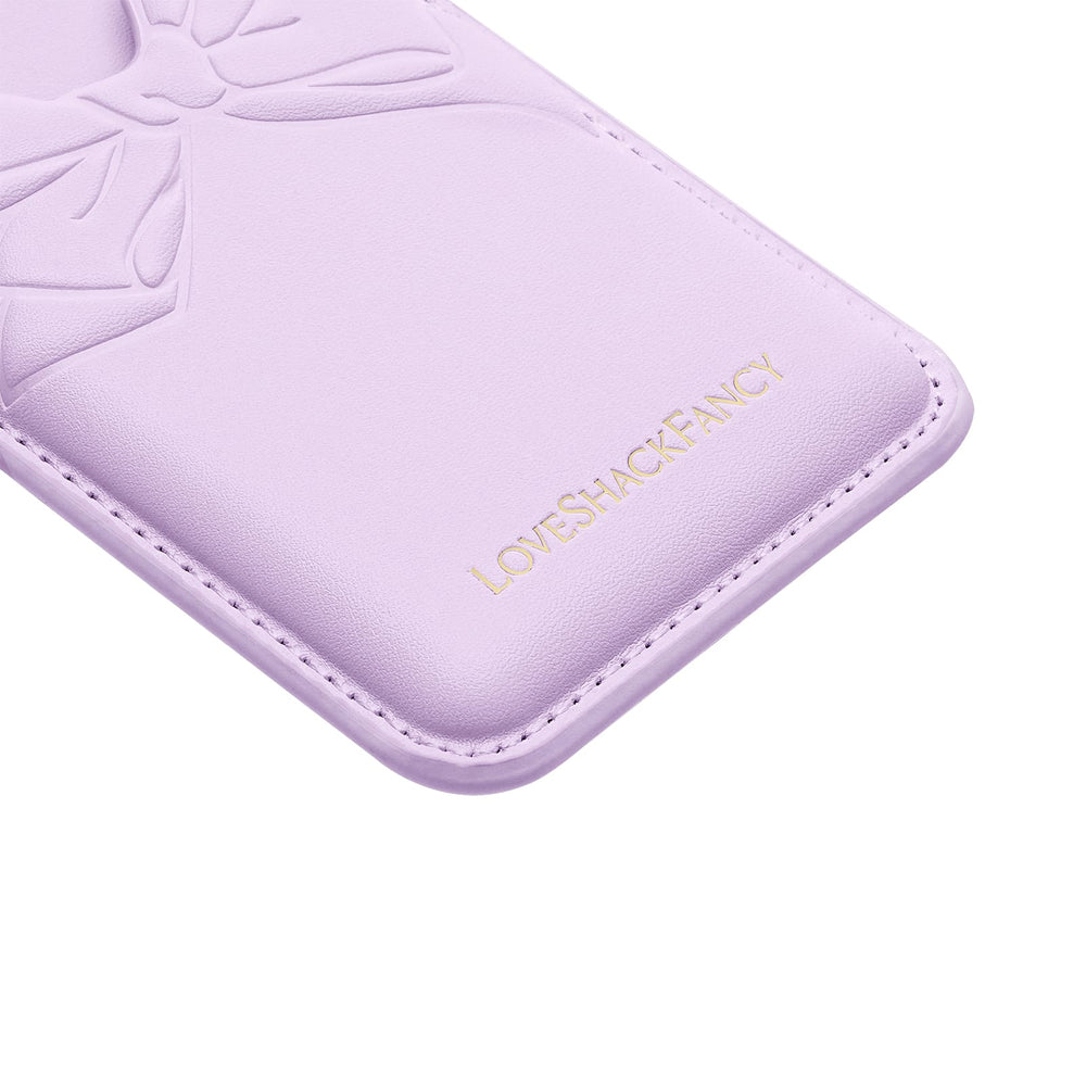 Purple phone case with 'LOVE SHACK FANCY' branding on a white background
#color_purple
