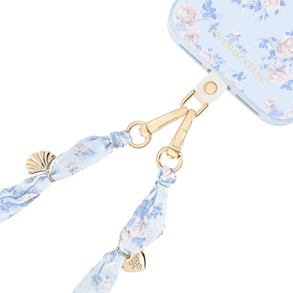Floral lanyard with gold accents attached to a phone case on a white background
#color_everblooming rosettes