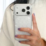 Person holding a phone with a clear bubble glitter case
#color_twinkle