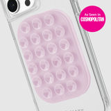 Phone case with pink textured design and clear back, featuring Cosmopolitan logo.
#color_stardust