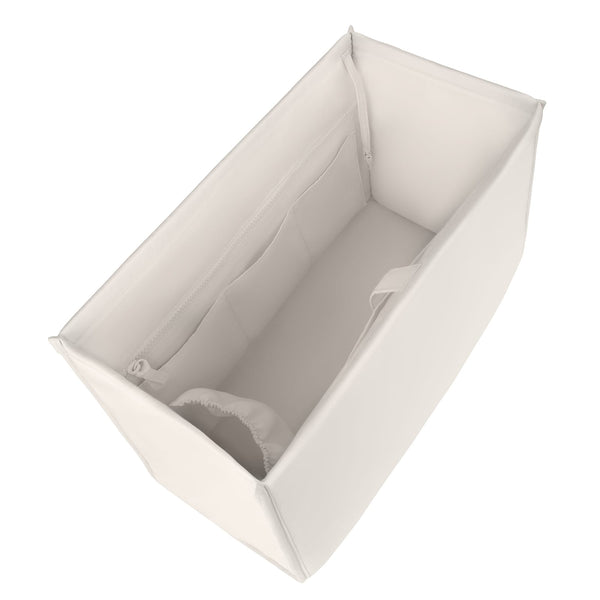 A white fabric baby carrier or storage pouch shown from an elevated angle, featuring a zippered closure and interior pockets, set against a plain white background.

#color_french vanilla 