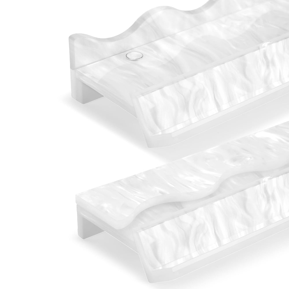 Two white acrylic shelf risers with a wavy top edge and a small circular cutout, shown on a clean white background.
#color_ivory pearl