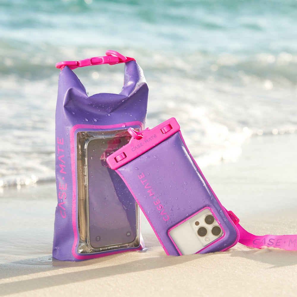 Purple and pink phone cases with a handle on a beach #color_purple paradise