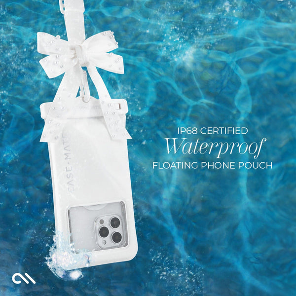 White waterproof floating phone pouch with a bow, hanging in water, on a blue water background.
#color_ivory pearl bow