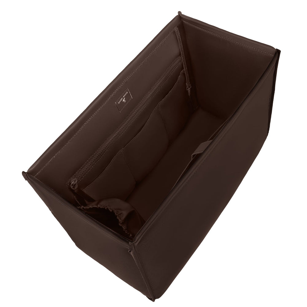 A dark brown structured tote bag organizer insert shown from an elevated angle, featuring interior zippered compartments, on a solid white background.
#color_espresso