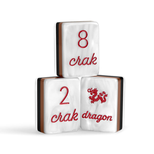 Three decorative mahjong-style tiles stacked in a pyramid on a white background. The top tile shows the red number 8, the bottom left tile shows the red number 2 and the word crak, and the bottom right tile shows a red dragon and the word dragon.
#color_tortoiseshell pearl edition