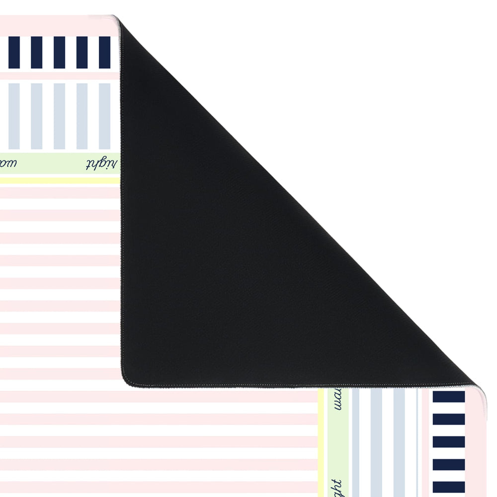 A black mouse pad shown folded over to reveal a pastel striped and patterned reverse side on a white background.
#color_classic cabana stripe