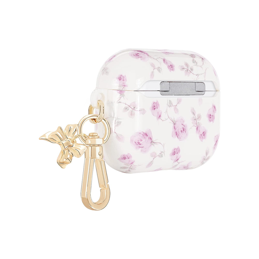 Floral design case with a gold clip on a white background
#color_ribbon rosa flora