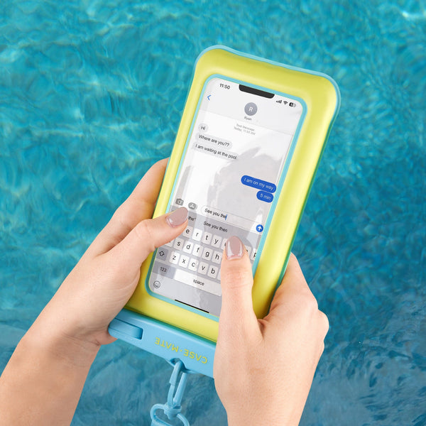 Person using a phone with a yellow case by a pool #color_citrus splash