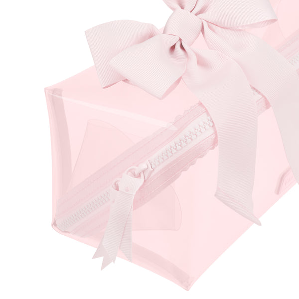 A light pink translucent zippered pouch with a matching pink grosgrain ribbon bow on top, shown against a solid white background.
#color_ballet pink bow