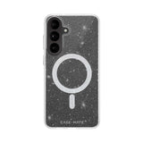 A clear phone case with a black glittery interior featuring a large white magnetic ring and a white starry speckle pattern, shown on a white background.

#color_sheer twinkle silver