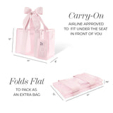 CARRY-ON AIRLINE APPROVED TO FIT UNDER THE SEAT IN FRONT OF YOU. FOLDS FLAT TO PACK AS AN EXTRA BAG. #color_ballet pink bow