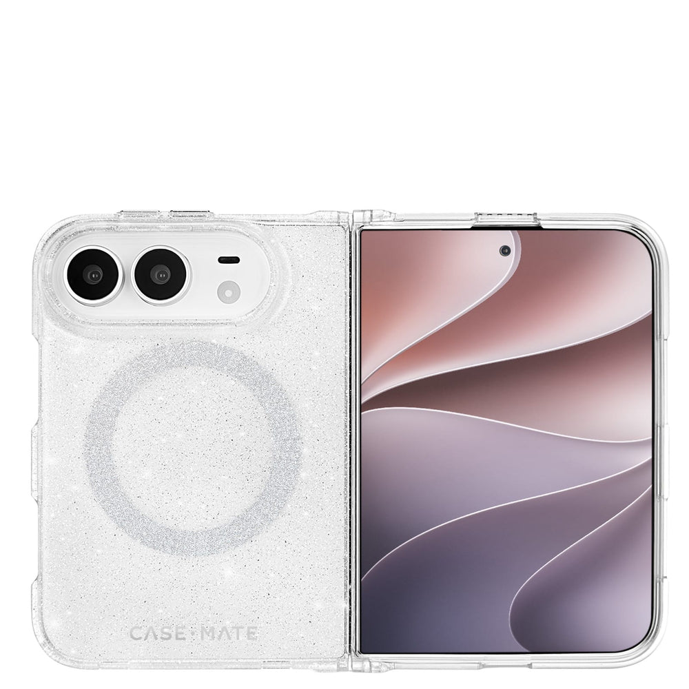 A clear, glittery phone case with a circular MagSafe ring, shown on a foldable smartphone. The phone is open, displaying a pink and purple abstract wallpaper, against a solid white background.
#color_sheer twinkle silver