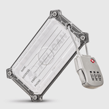 Brushed aluminum luggage tag with clear ID window and attached three-digit combination lock.