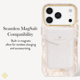 A Kendra Scott phone case with a cream and gold marble pattern, featuring a white textured leather card pocket on the back. The case is shown on a phone with a gold-toned camera ring, set against a clean off-white background with text highlighting seamless MagSafe compatibility.

#color_champagne oyster pearl