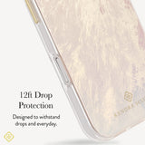 A close-up of a clear phone case with a soft iridescent blush and pale gold marbled pattern, shown on a phone edge. Text on the left reads '12ft Drop Protection' and 'Designed to withstand drops and everyday.
#color_cream pearl