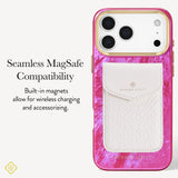 A pink marbled phone case with a white textured card holder pocket and gold-toned camera surround, shown on a light gray background with text about seamless MagSafe compatibility. 
#color_raspberry pearl