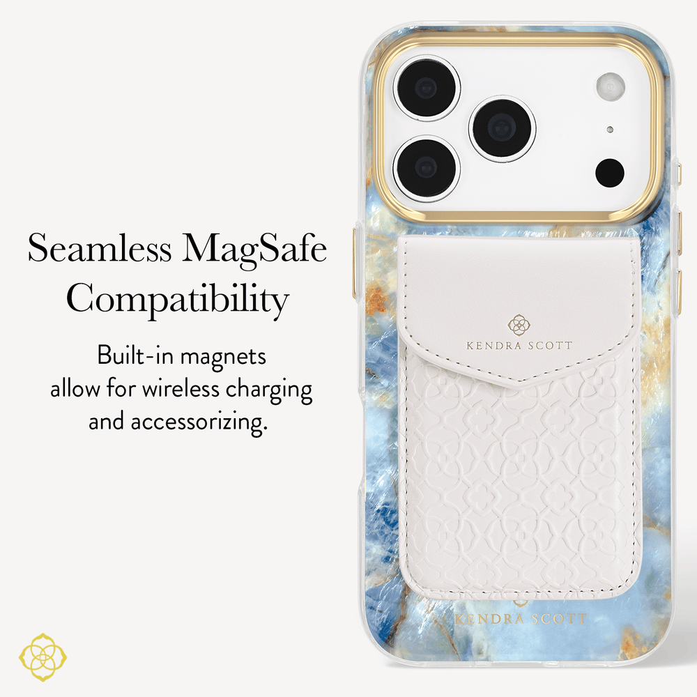 A Kendra Scott phone case with a blue and white marble pattern, featuring a built-in white textured card holder pocket. The image includes text highlighting 'Seamless MagSafe Compatibility' and 'Built-in magnets allow for wireless charging and accessorizing

#color_blue agate