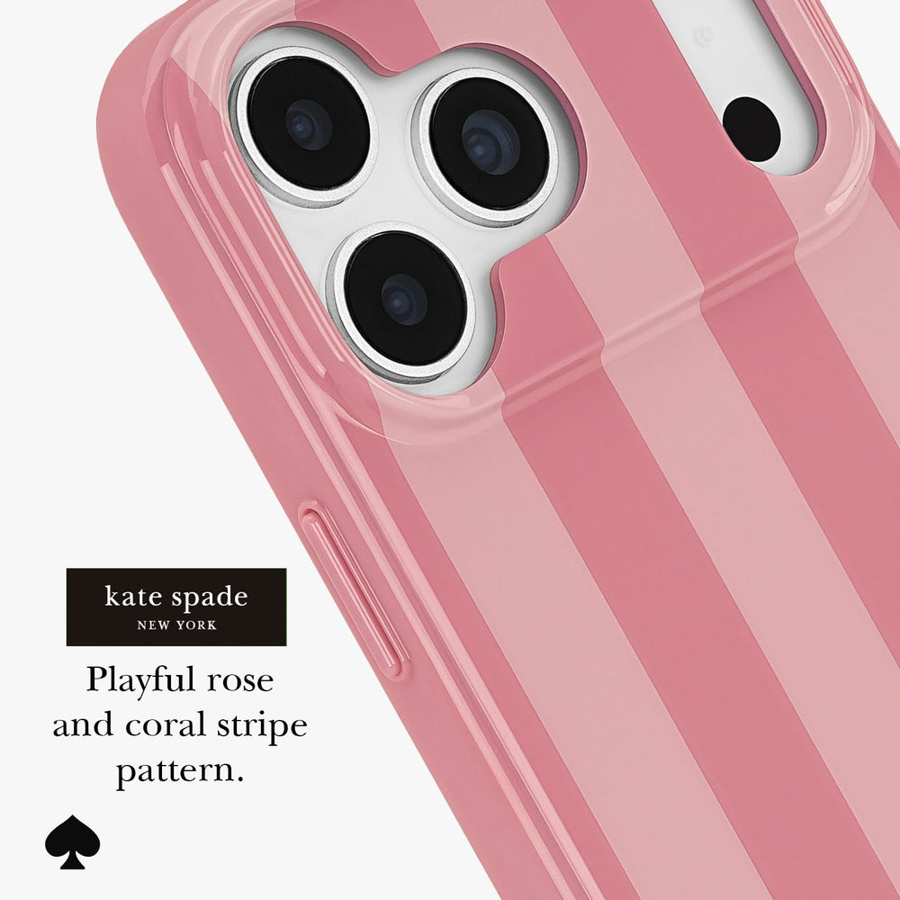 A close-up of a pink phone case with vertical rose and coral stripes, shown on a white background with a black label reading 'kate spade NEW YORK' and 'Playful rose and coral stripe pattern.'.
#color_stripe rose coral