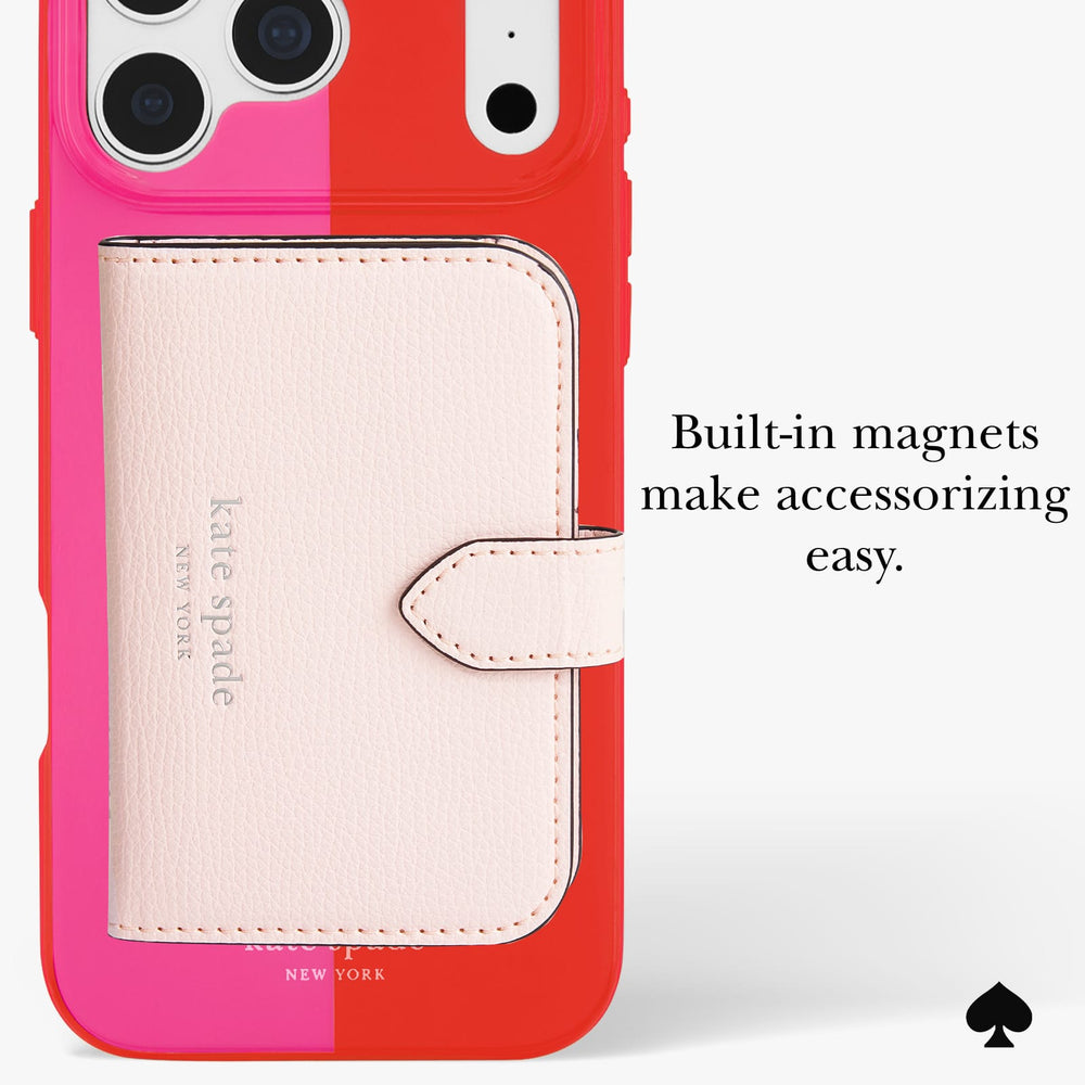 Kate Spade New York phone case in a bright red and hot pink color-blocked design, featuring a light pink faux-leather magnetic wallet card holder. The image includes text that reads 'Built-in magnets make accessorizing easy.
#color_racing stripe pop pink