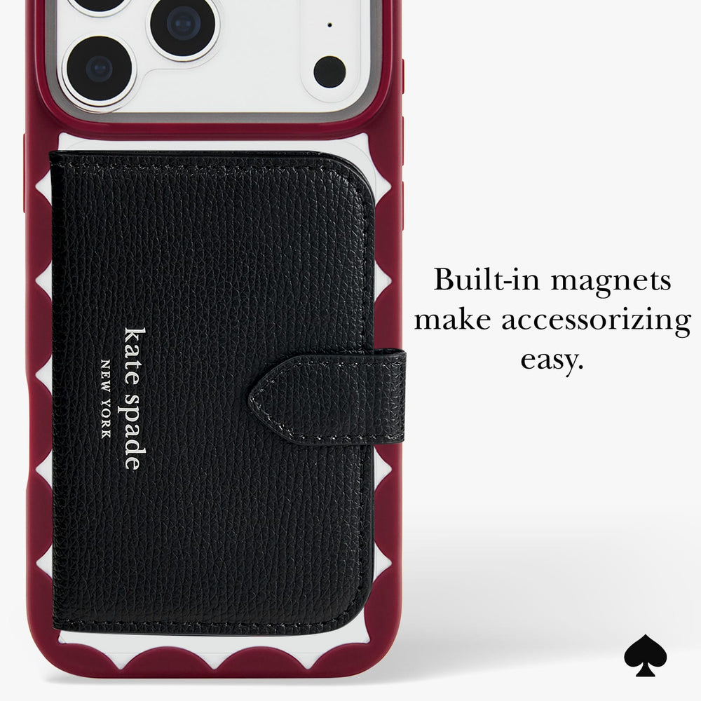 A Kate Spade New York phone case in burgundy and white with a built-in black leather card holder and wallet. The image includes text that reads 'Built-in magnets make accessorizing easy.
#color_scallop cherry glaze
