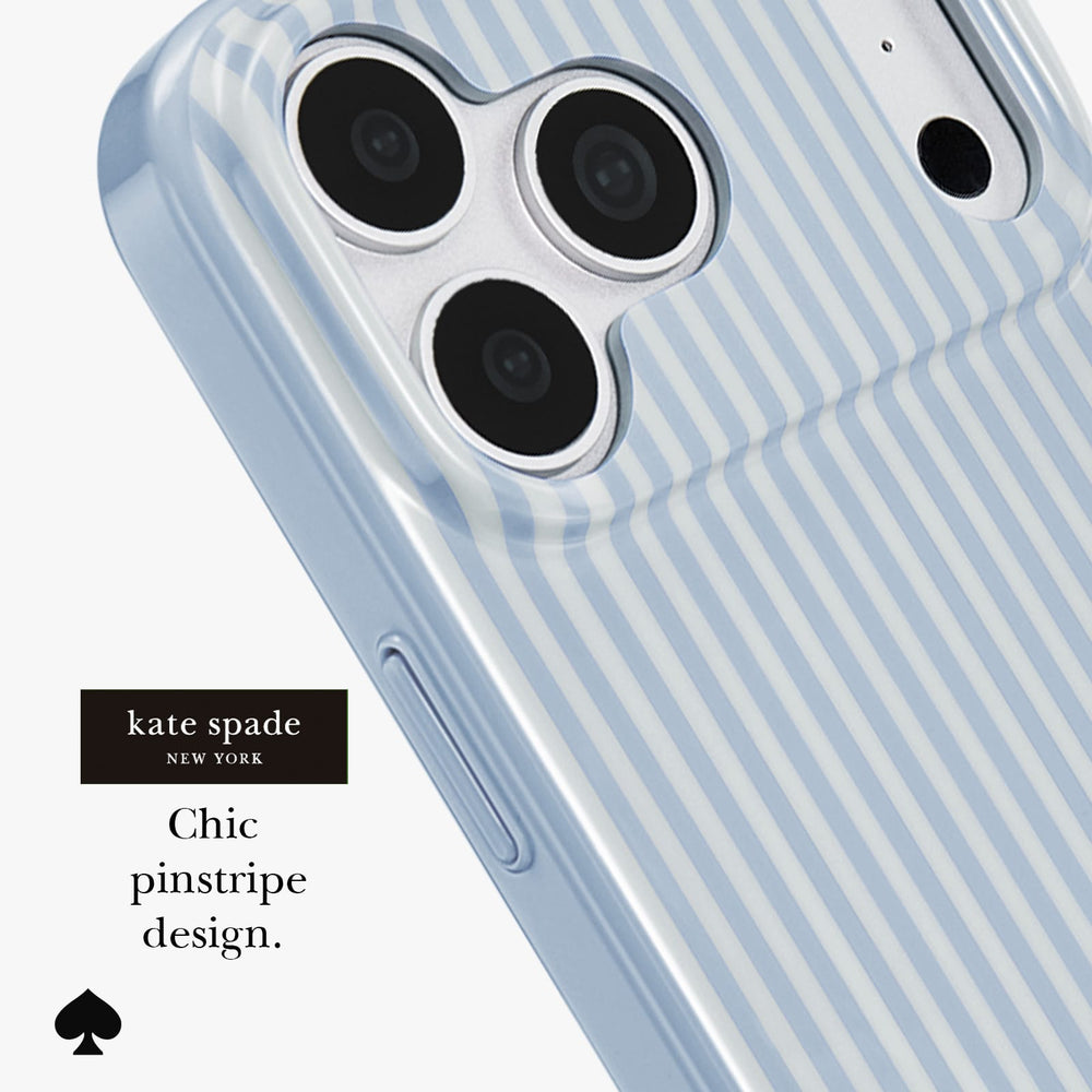 A close-up of a phone case with a light blue and white pinstripe pattern, shown on a phone with the brand label 'kate spade NEW YORK' and text reading 'Chic pinstripe design.'.
#color_diamond blue stripe