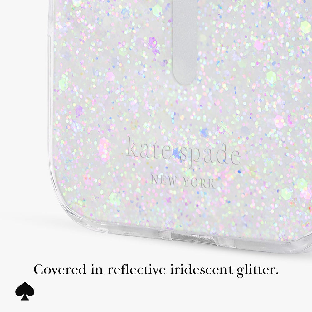 A close-up of a clear phone case covered in reflective iridescent glitter, with the Kate Spade New York logo debossed near the bottom. Text below reads, 'Covered in reflective iridescent glitter.
#color_chunky glitter