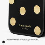 Close-up of a black Kate Spade New York accessory with metallic gold polka dots and gold brand lettering, shown on a white background with the text 'Adorned with metallic gold details.'.

#color_metallic classic dot

