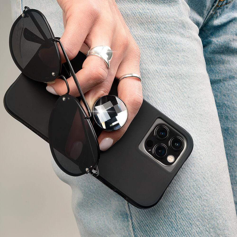Black crystal circular pop on phone grip helps you carry more at once. color::color::Black