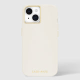 Beige silicone smartphone case with gold-trim camera cutout and matching side buttons for iPhone.