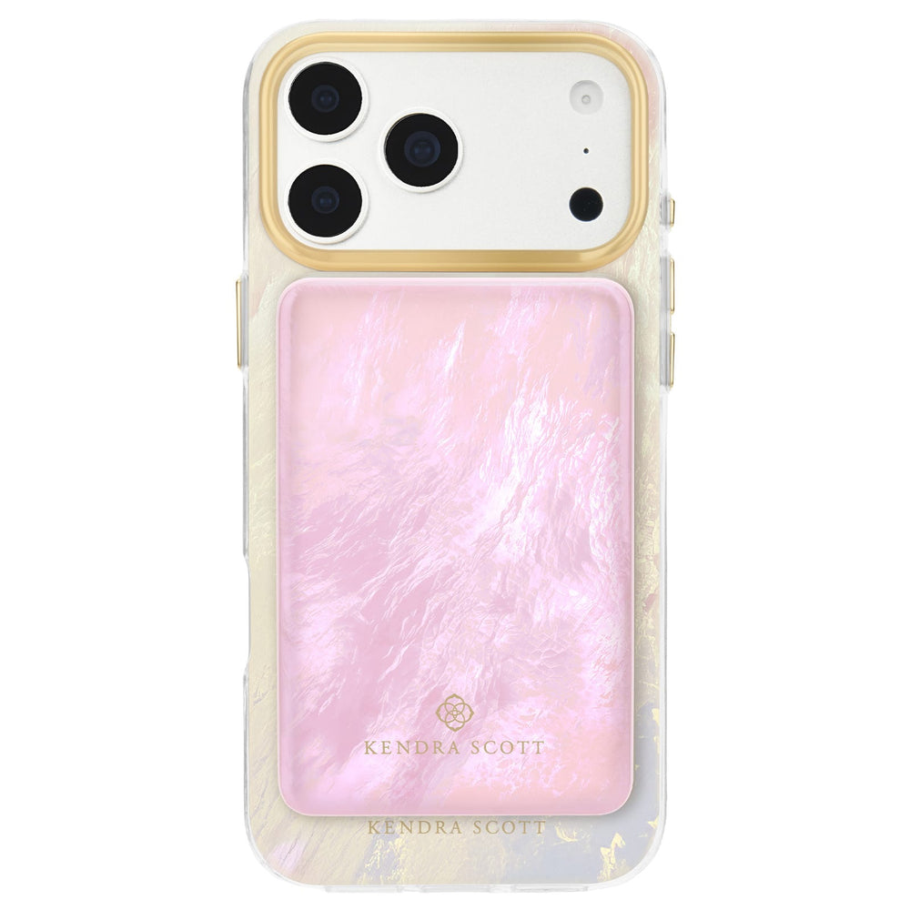A Kendra Scott magnetic phone case with a gold-trimmed camera border and a pink pearlescent iridescent back, shown on a white phone against a white background. Matching MagSafe Portable Charger attached to back of phone case

#color_pink pearl