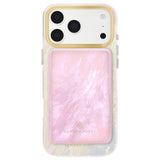 A Kendra Scott magnetic phone case with a gold-trimmed camera border and a pink pearlescent iridescent back, shown on a white phone against a white background. Matching MagSafe Portable Charger attached to back of phone case

#color_pink pearl