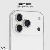 A close-up of a white smartphone showing the back camera area with three lens protectors installed, plus the text 'individual lens protection' above. The product appears to be lens protectors rather than the phone itself.

#color_twinkle
