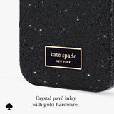 Close-up of a black sparkly crystal-covered phone case with a gold-bordered 'kate spade NEW YORK' logo patch. Text below reads 'Crystal pavé inlay with gold hardware.
#color_crystal pavé