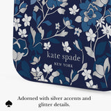 Kate Spade New York clutch or pouch in navy blue with a white and blue floral pattern and silver glitter accents, shown on a white background with descriptive text below.
#color_flowerbed navy
