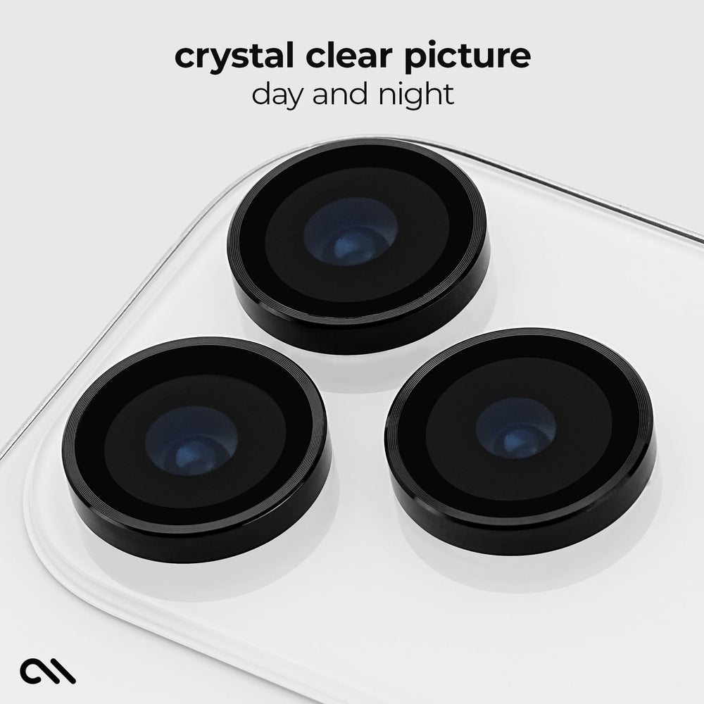 Three circular black camera lens protectors shown on a white phone back, with text reading 'crystal clear picture day and night' above and a small logo in the lower left corner.
#color_midnight black