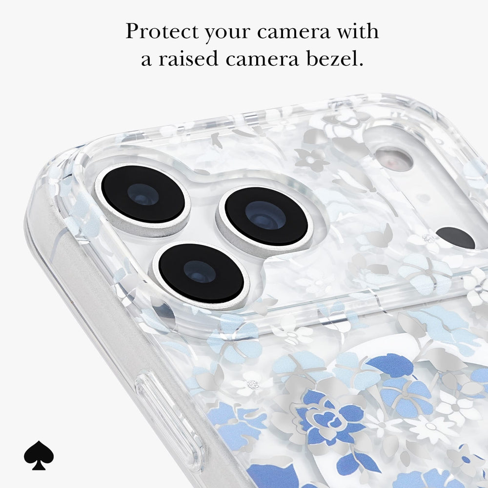 A clear phone case with a blue and white floral pattern, shown on a phone with a raised camera bezel. Text at the top reads 'Protect your camera with a raised camera bezel.

#color_flowerbed blue