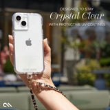 Clear Case-Mate iPhone 15 case with dual camera cutout, held in hand with attached chain strap.