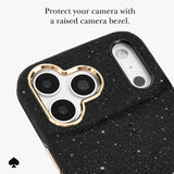 Black textured phone case with a gold heart-shaped camera bezel, shown on a light gray background with promotional text and a spade logo.
#color_crystal pavé