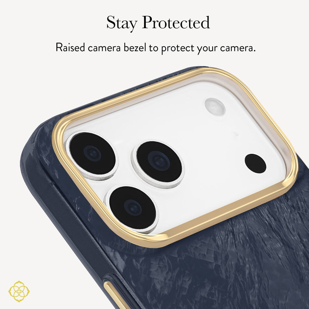 Close-up of a phone case with a raised gold bezel around the camera cutout, shown on a white phone against a light gray background. Text at the top reads 'Stay Protected' and 'Raised bezel to protect your camera.
#color_navy pearl