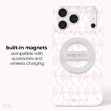 A white phone case with a light pink floral and bow pattern, featuring a built-in silver magnetic ring. The image includes text on the left stating 'built-in magnets compatible with accessories and wireless charging'.

#color_ballet pink bow
