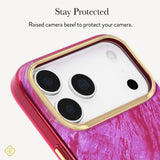 A close-up of a phone case with a textured pink and purple marbled design, a gold raised bezel around the camera cutout, and black camera lenses visible. Text at the top reads 'Stay Protected' and 'Raised bezel to protect your camera.
#color_raspberry pearl