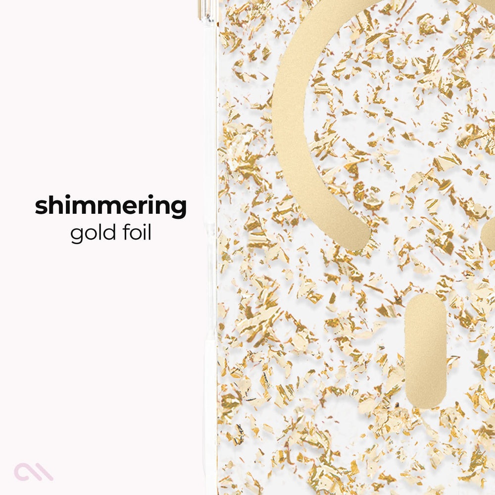 A close-up of a clear or white surface decorated with shimmering gold foil flakes and metallic gold cutout shapes, with the text 'shimmering gold foil' on the left.
#color_karat
