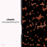 A close-up of a smartphone or phone edge showing a tortoiseshell-style pattern in black and warm brown, with the text 'classic tortoiseshell print' on a white side panel.

#color_tortoiseshell
