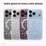 Four transparent phone cases with white confetti-like speckles and a circular MagSafe-compatible ring design, shown in gray, silver, plum, and light blue. Text at the top reads 'looks good on every color phone'.

#color_karat crystal