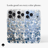 Three Kate Spade New York clear phone cases with a blue and white floral print are shown on a light gray background with the text 'Looks good on every color phone.' A black spade logo appears in the bottom-left corner.

#color_flowerbed blue