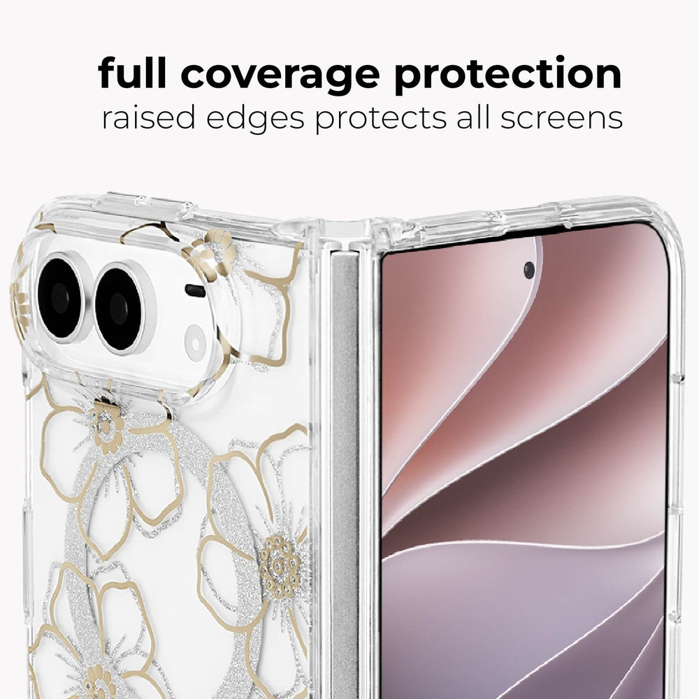 A clear phone case with a white and silver floral pattern outlined in gold, shown on a smartphone against a light gray background. Text at the top reads 'full coverage protection raised edges protects all screens'.
#color_floral gems