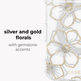 A clear phone case with large silver and gold floral designs and small gemstone accents, shown next to text that reads 'silver and gold florals with gemstone accents'.
#color_floral gems